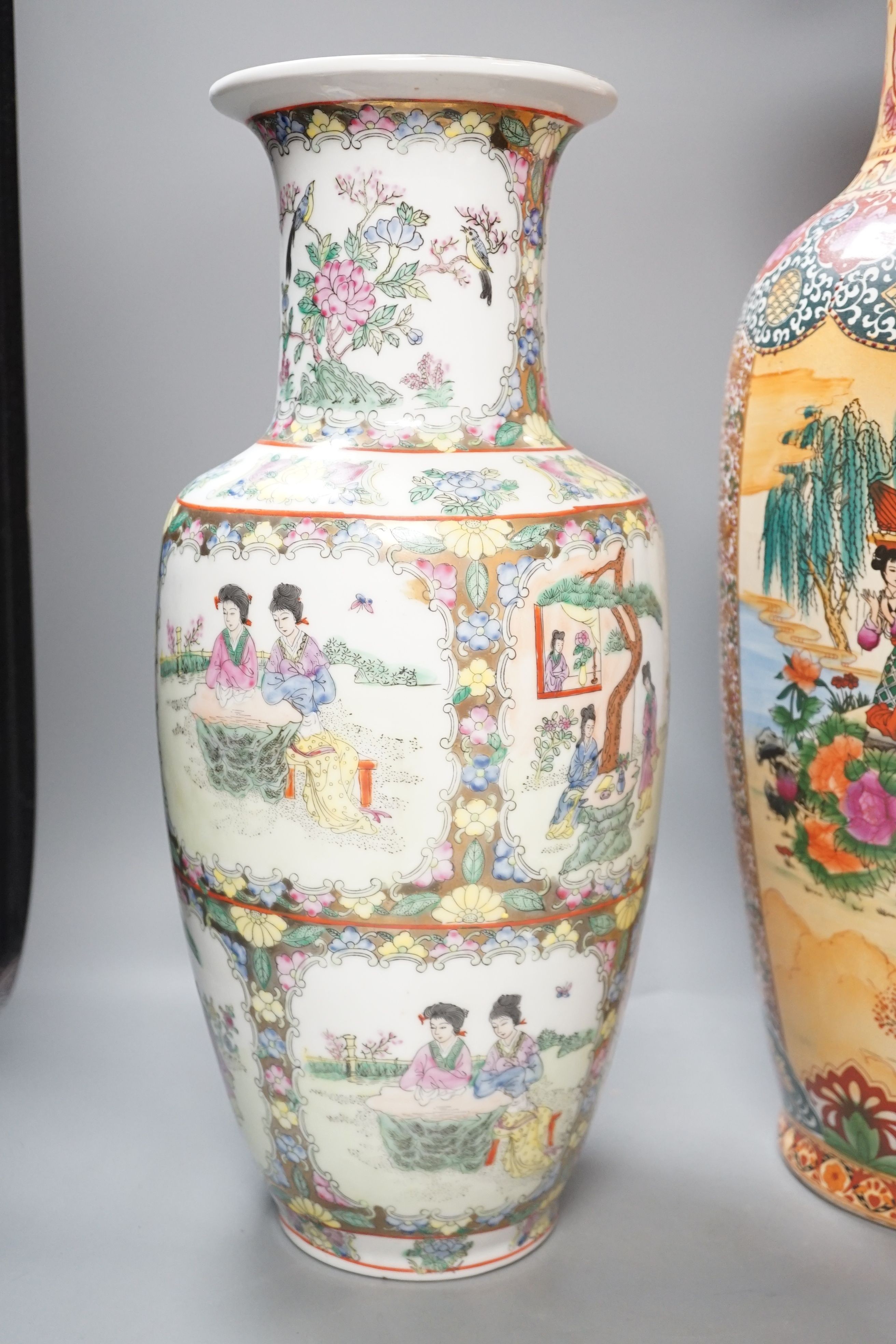 Three 20th century Chinese famille rose vases, tallest 61cm